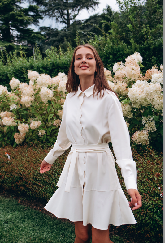 White wool shirt dress with wave-shaped placket